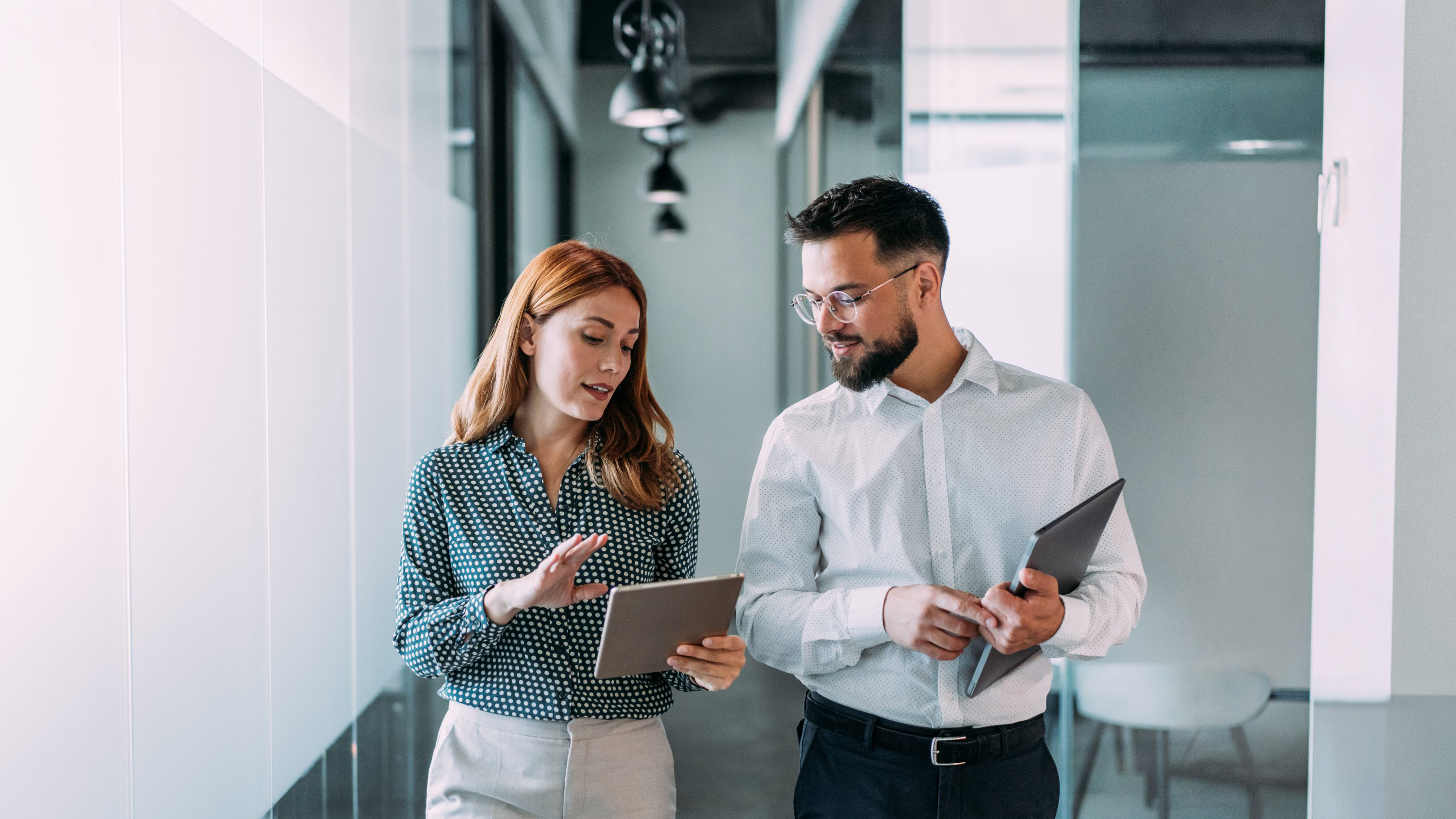 two people talking in the corridor