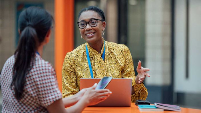 two-teachers-in-conversation