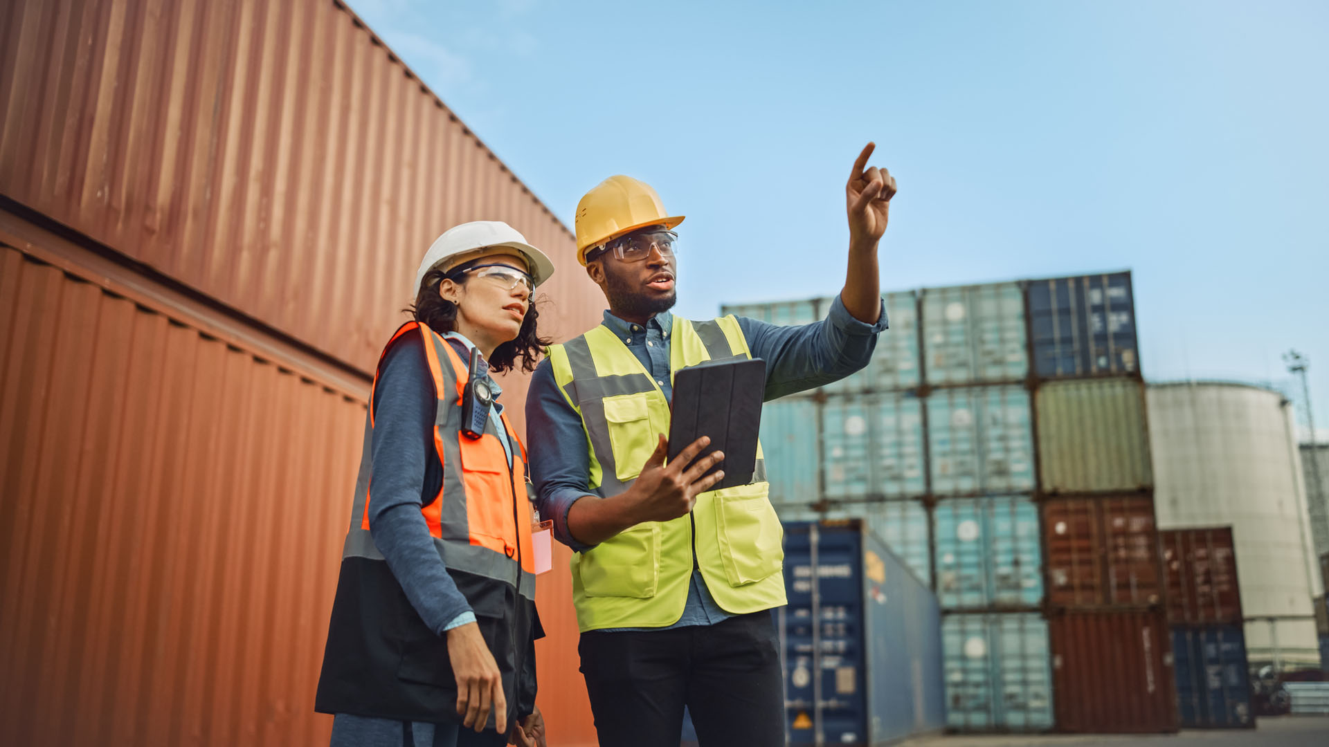 Two workers in shipping dock
