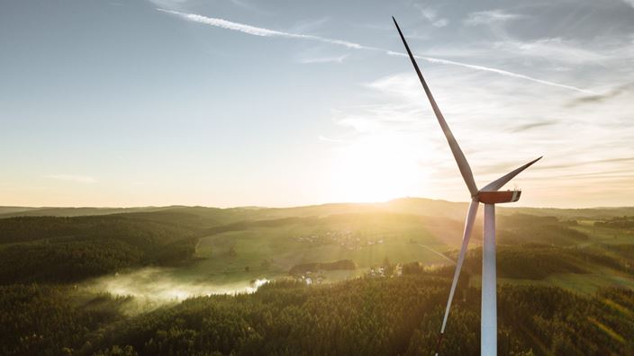 wind turbine and mountains