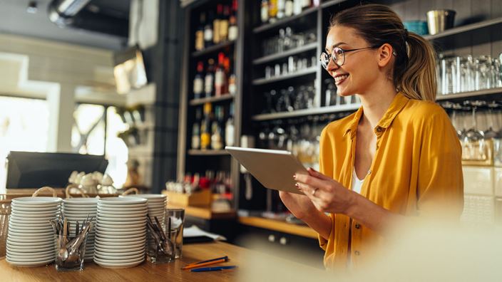 woman at shop counter