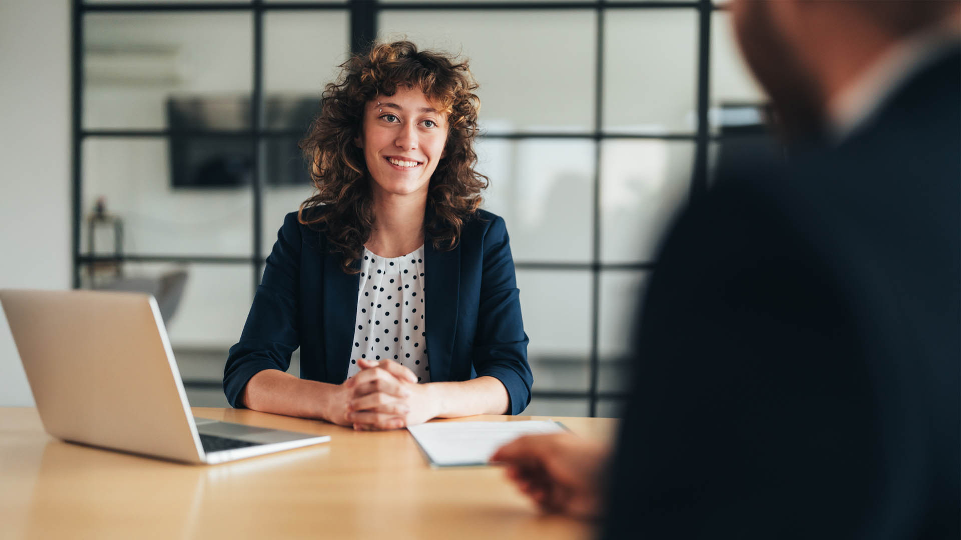 Woman interviewing man