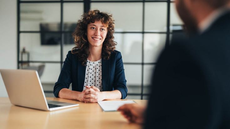 Woman interviewing man