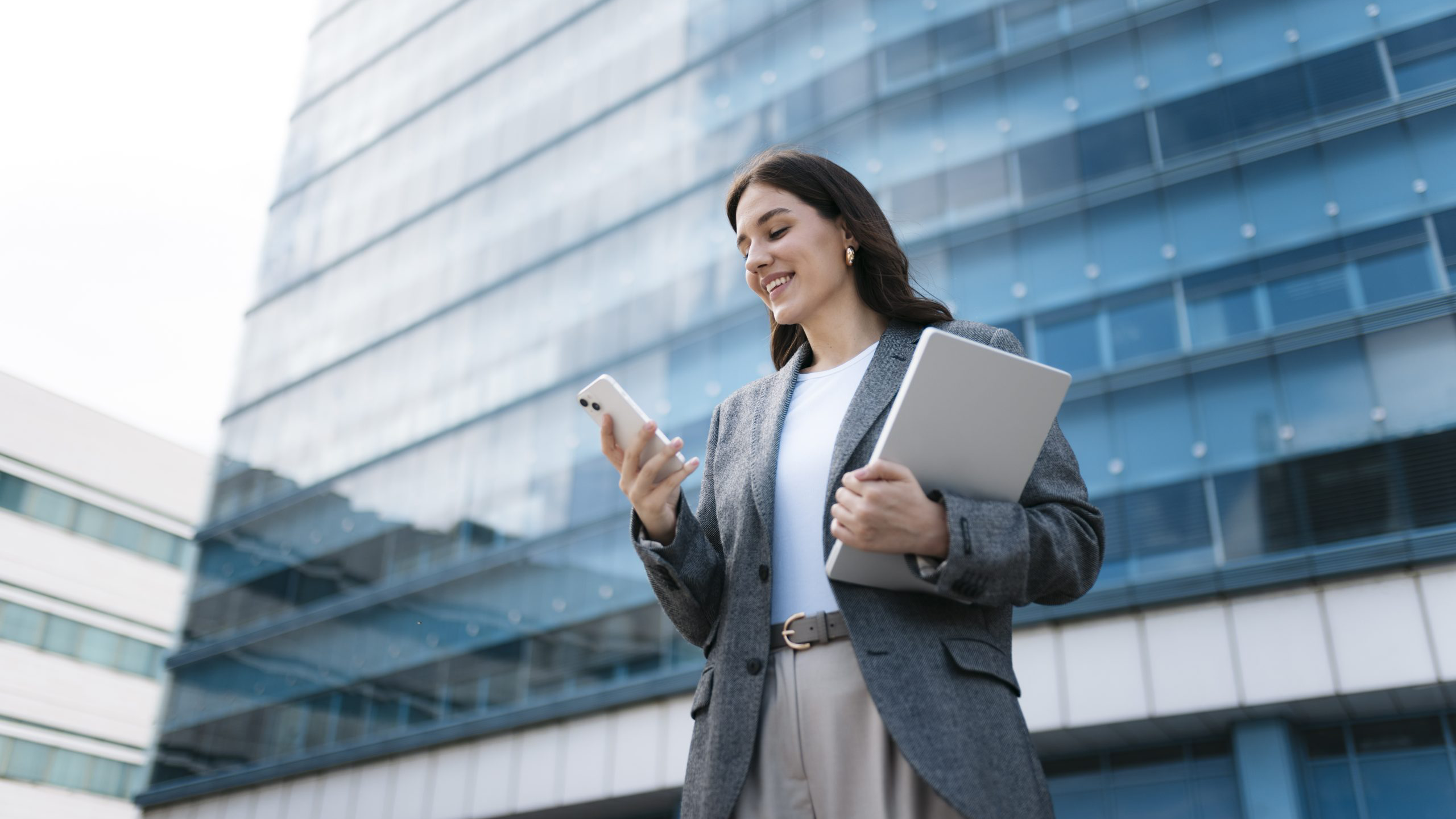woman on mobile phone outside office