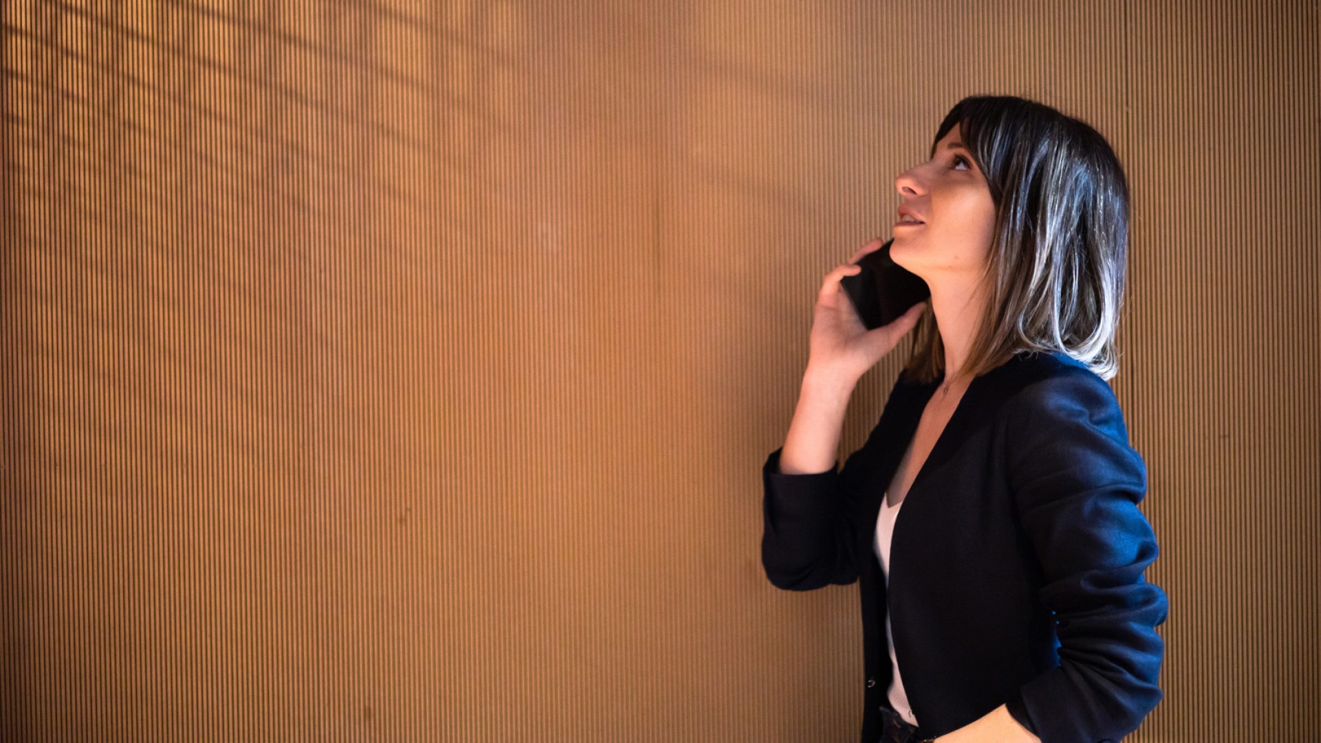 woman on phone looking to the left