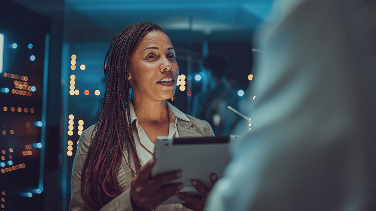 woman on tablet in data centre