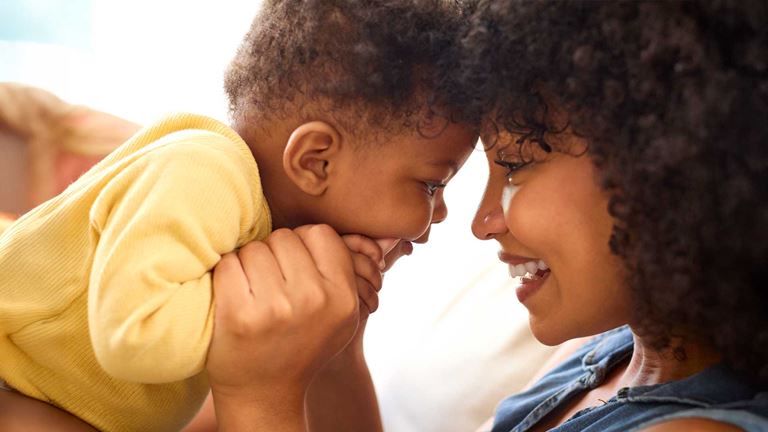 woman-smiling-at-baby