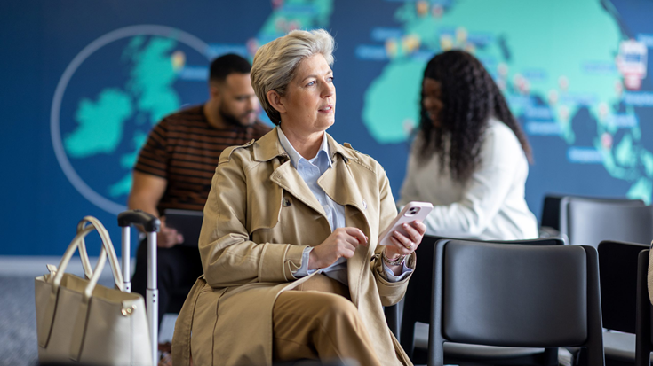 woman waiting at airport for flight