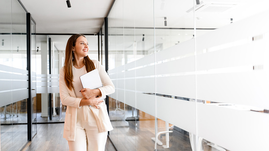woman walking past offices