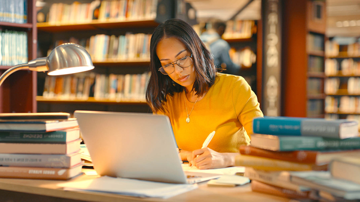 Woman working in library