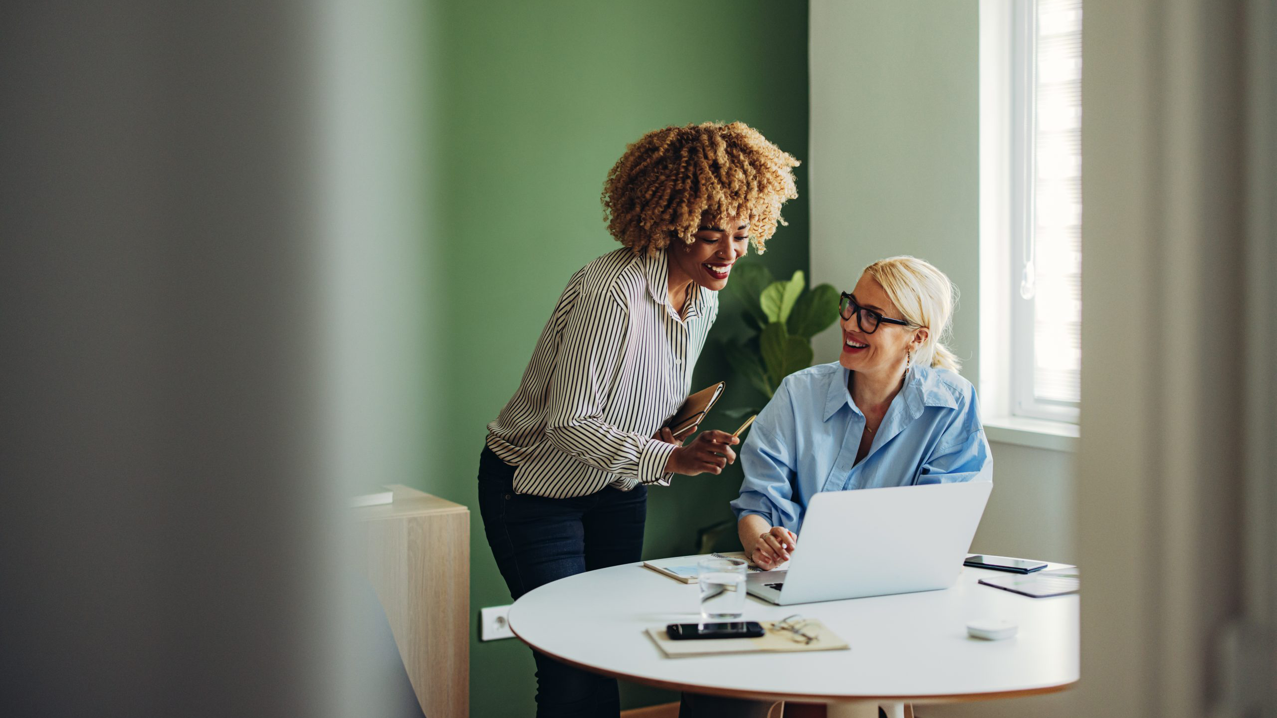 women working on computer