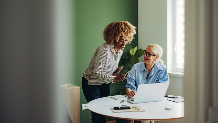women working on computer