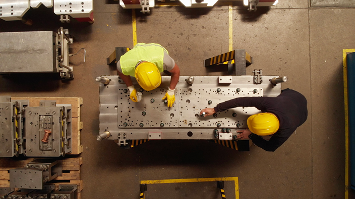 workers on construction line