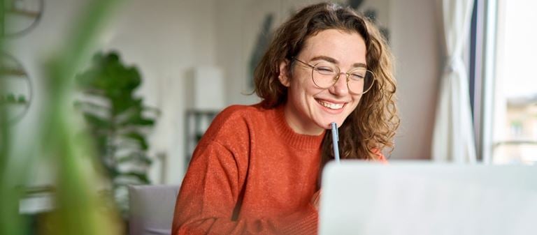 oung-lady-looking-at-laptop