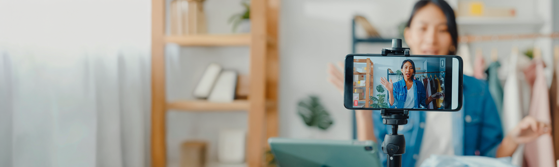 influencer filming a video on mobile phone