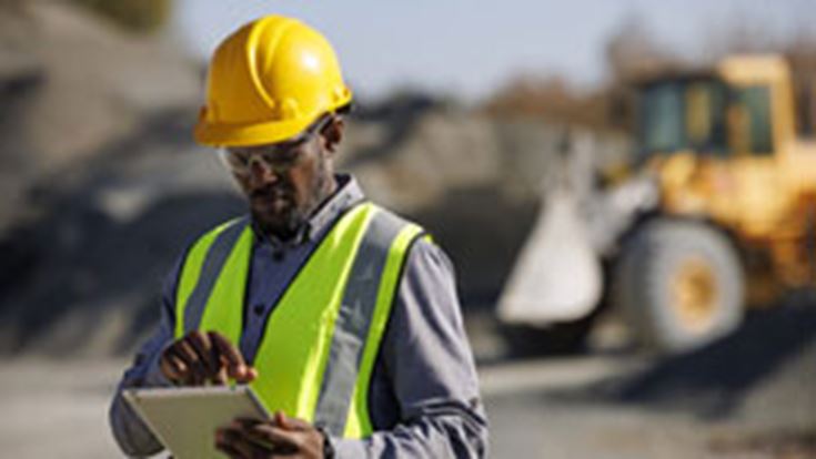 Man looking at ipad