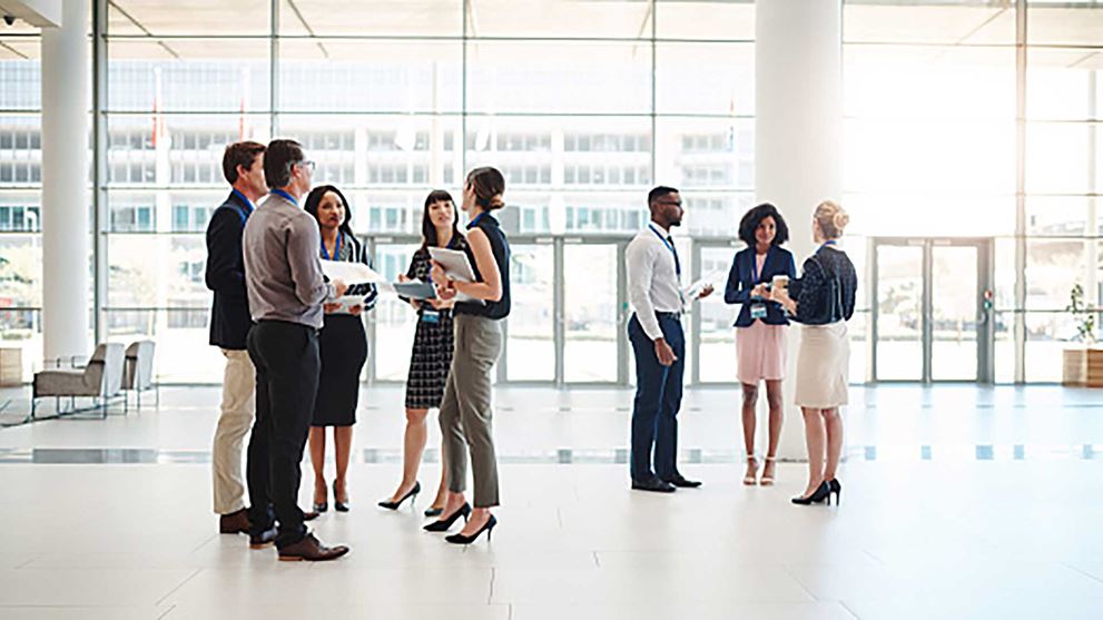 Professionals networking in the office