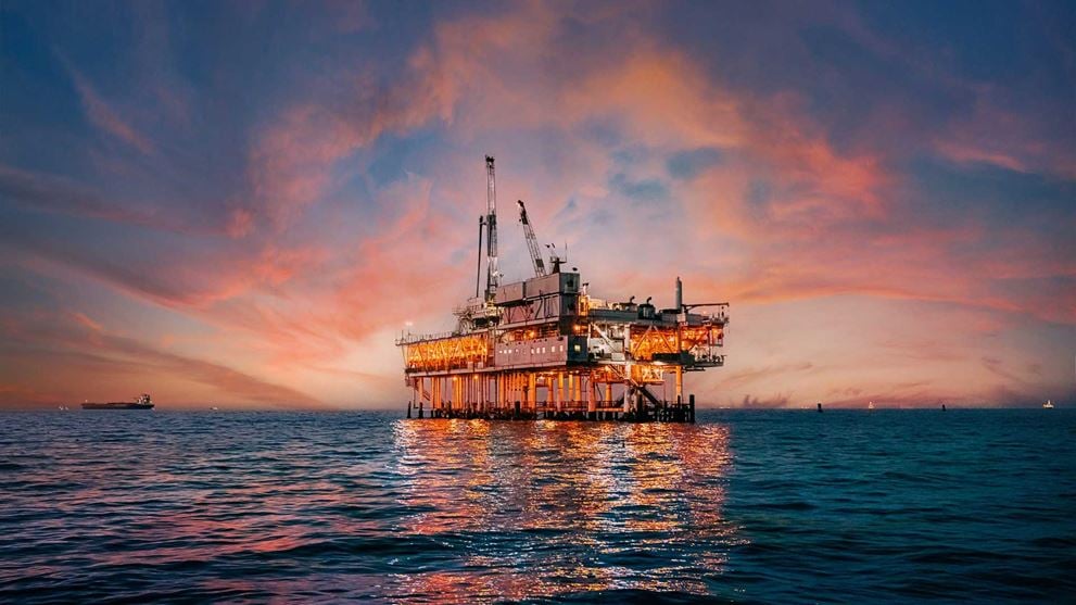 Oil rig at sunset