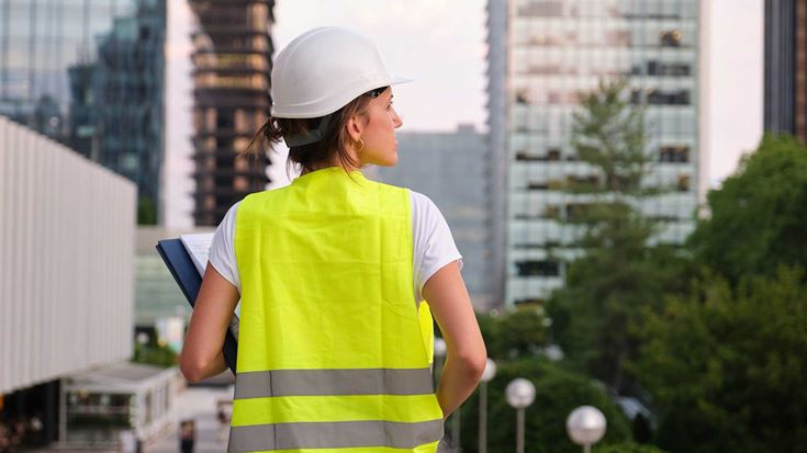 A surveyor inspecting