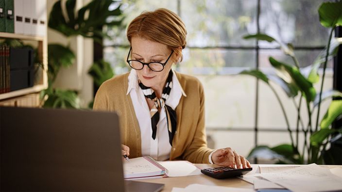 Woman calculating finances