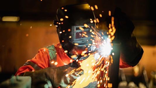 A worker welding