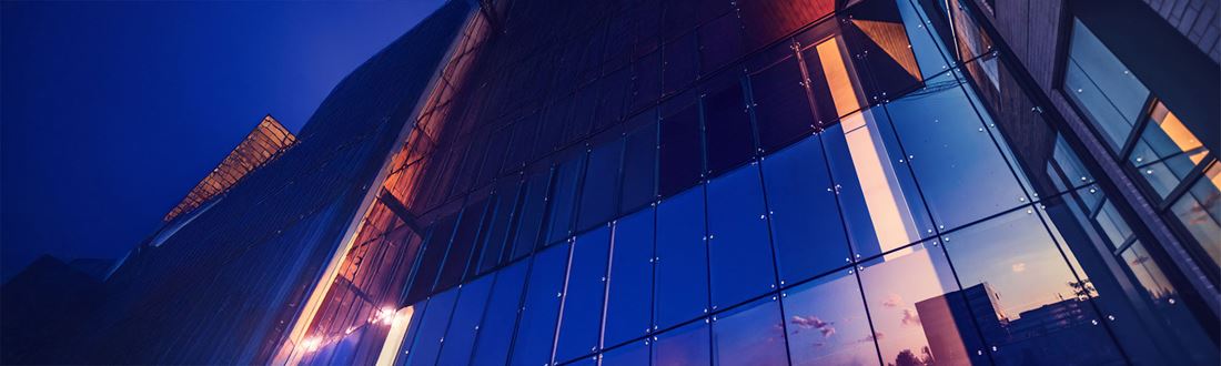 Buildings at night with reflection
