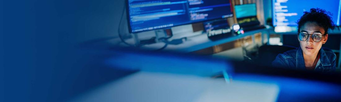 woman-looking-at-data-in-server-room