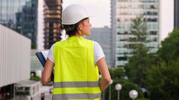 Female-worker-with-hi-vis-and-clipboard