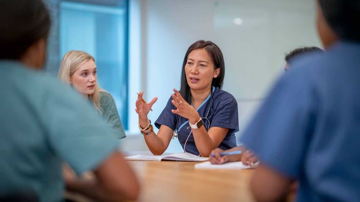 Health workers in discussion