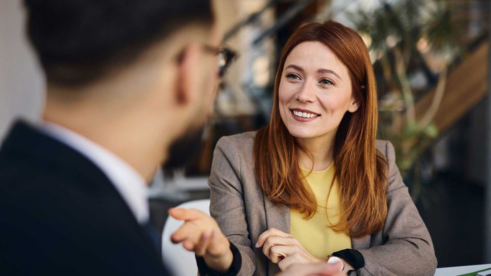 A businesswoman in conversation