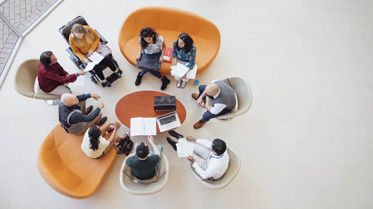 Diverse people meeting aerial shot