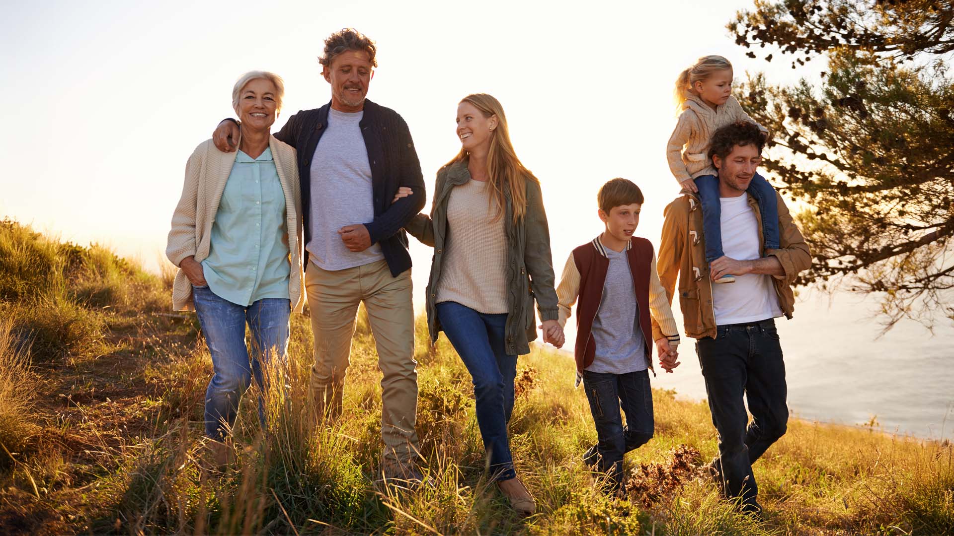 family walking through field