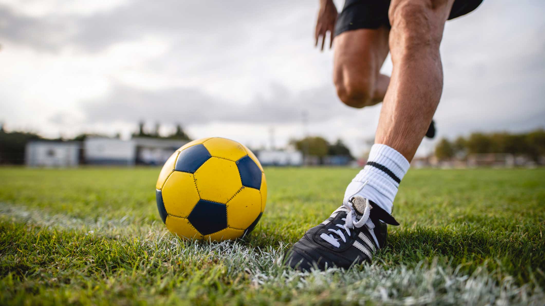 A football player kicking a ball