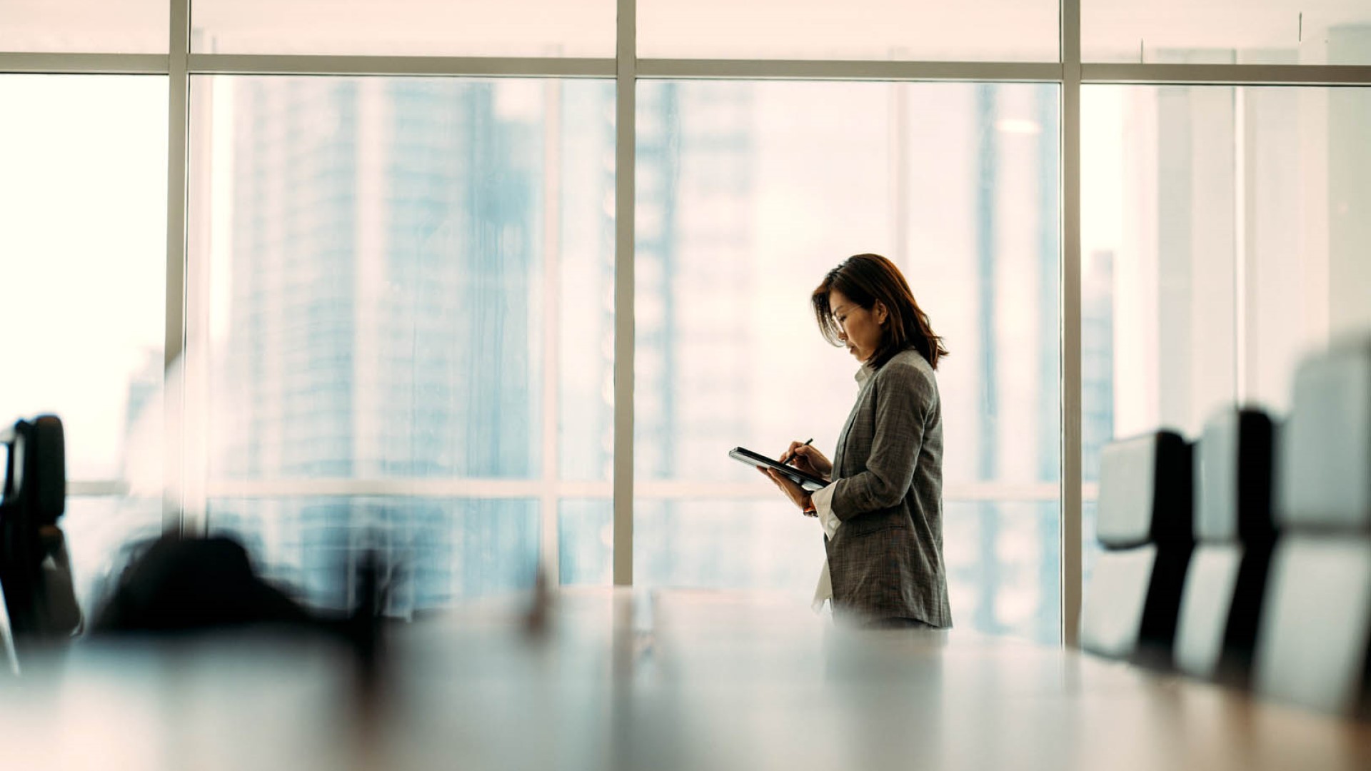 lady in the office with windows