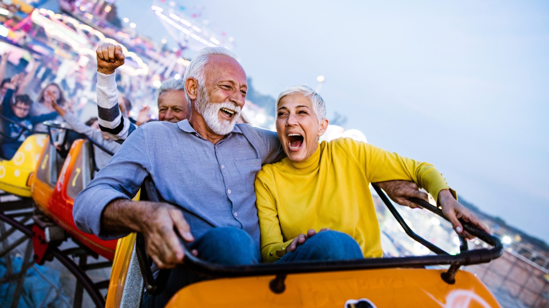 old couple on a rollercoaster