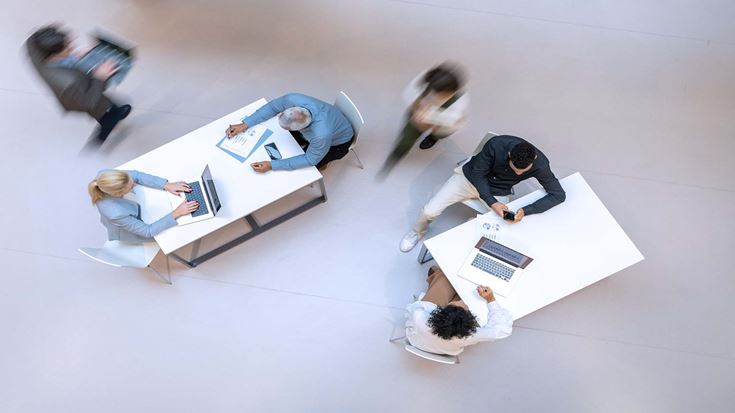 aerial view of people working in office