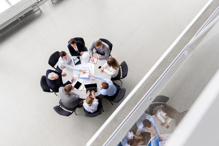 Professionals reviewing accounting records and tax information