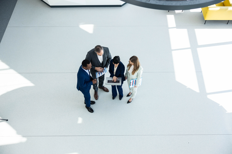  Finance professionals examining a financial report