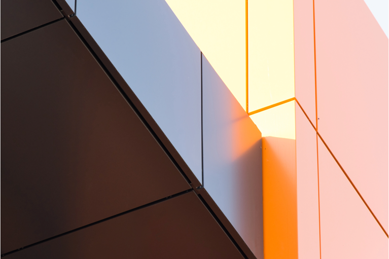 Geometric color elements of the building facade with planes lines corners with highlights