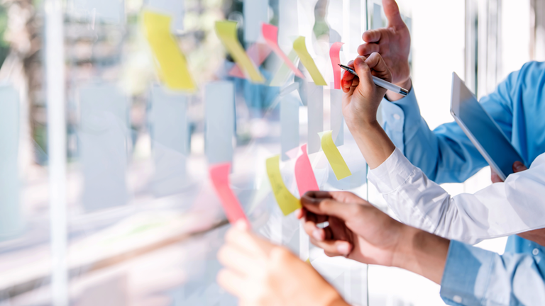 Leadership reviewing an operating model and transformation priorities