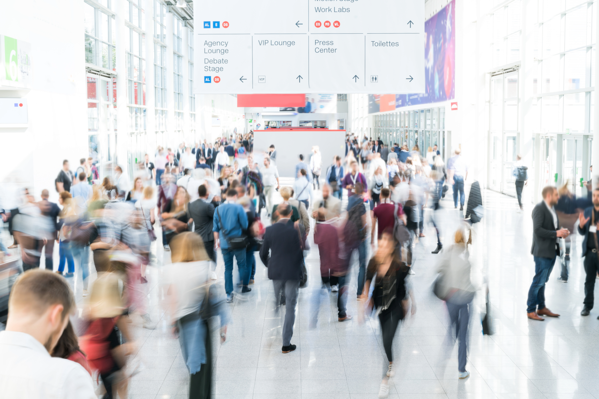 blurred people at a trade fair